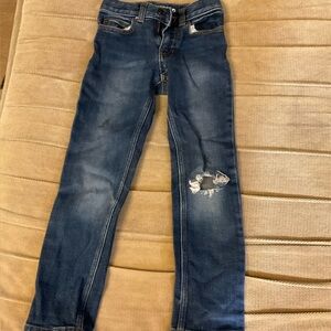Size 7s slim jeans with a hole